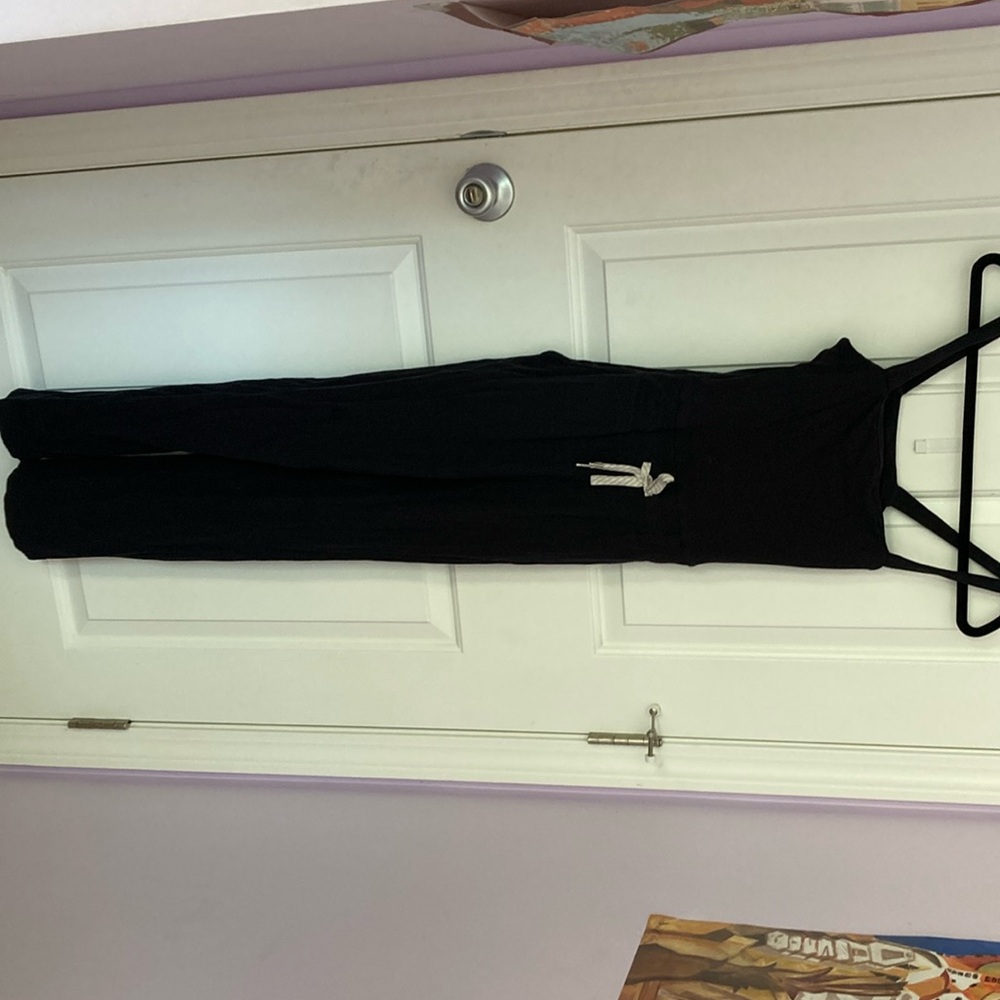 Black romper, wide legged, tie around waist